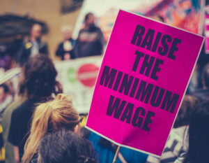 raise minimum wage sign